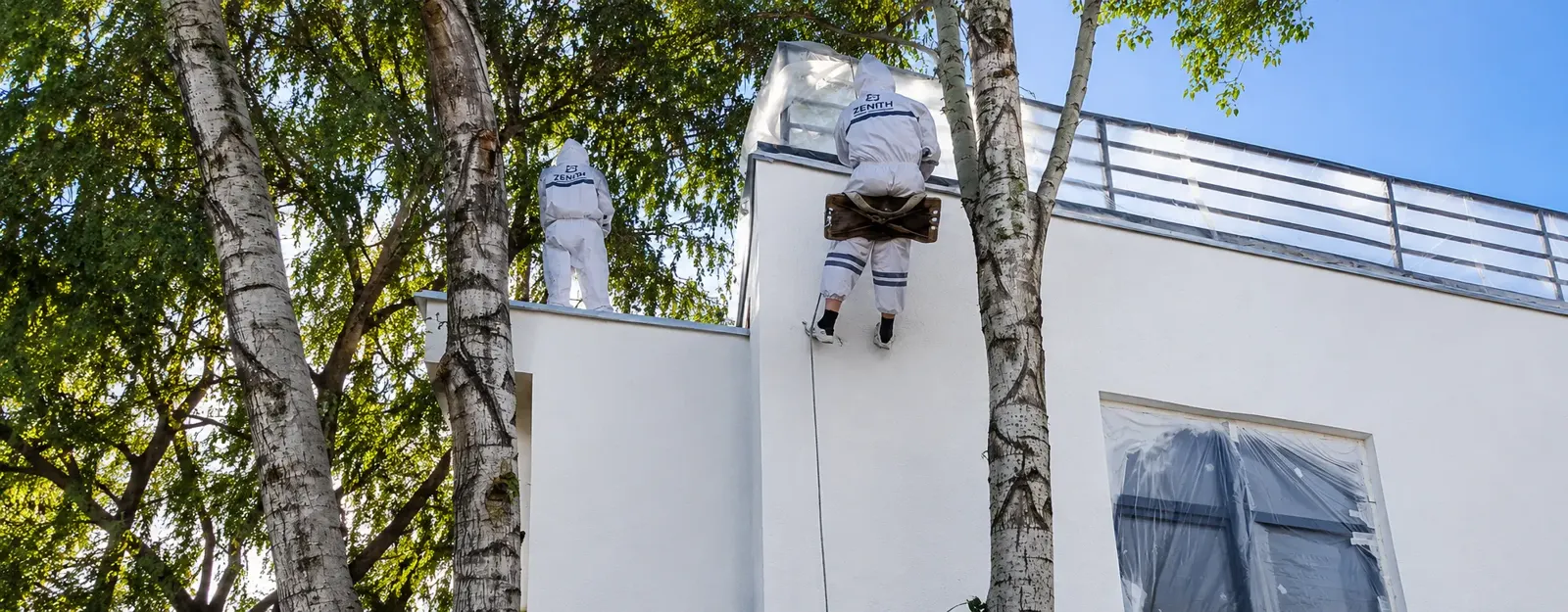 Фасад коттеджного городка «Garden Villa» в Алматы после работ: антикоррозионная защита